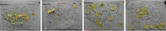 キッズ消防団員たちがグループごとに分かれて地図に一時避難場所、危険個所等を示すシールや調べたことが書かれた付箋が貼られた長久手市の地図4つの写真